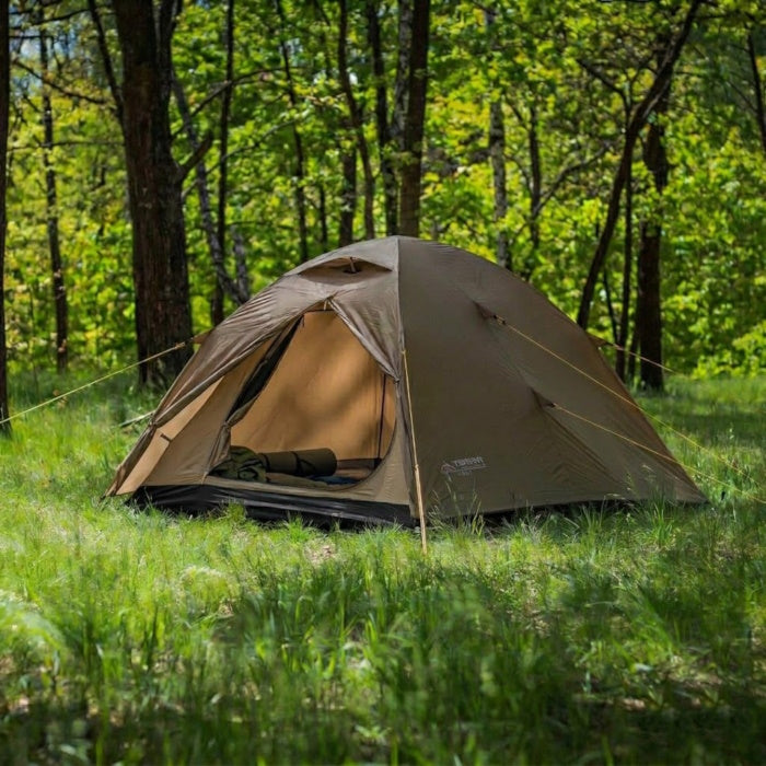 Load image into Gallery viewer, Sand-colored Terra Incognita Alfa 2 tent pitched in a sunny summer forest