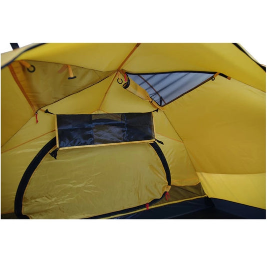 Interior view of yellow tent showing storage pocket, gear loft, and vent window