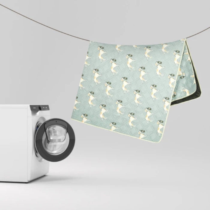 Load image into Gallery viewer, Machine washable picnic mat with dog print hanging for quick drying.
