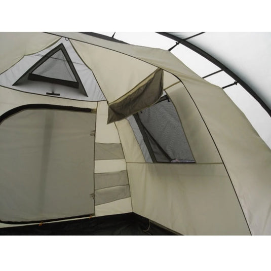 Sand color Olympia 4 tent interior with mesh windows and storage pockets