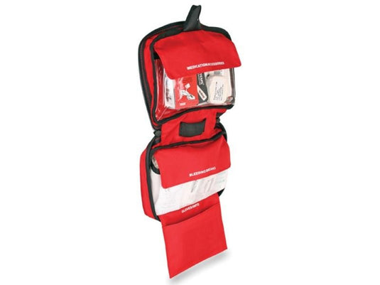 Red first aid kit with visible contents on a white background