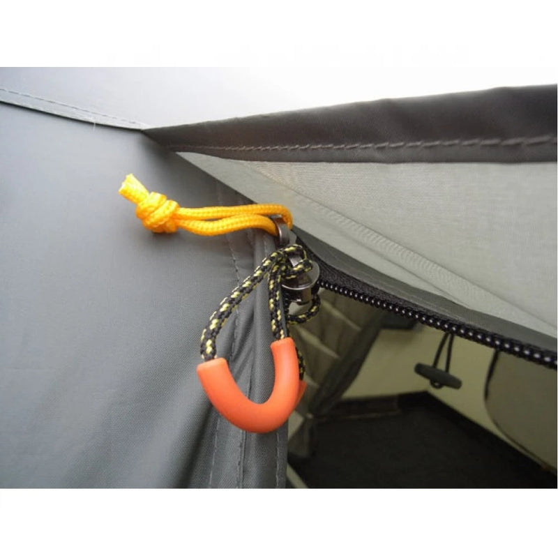 Load image into Gallery viewer, Close-up detail of the heavy-duty zipper on the Terra Incognita Olympia 4 camping tent
