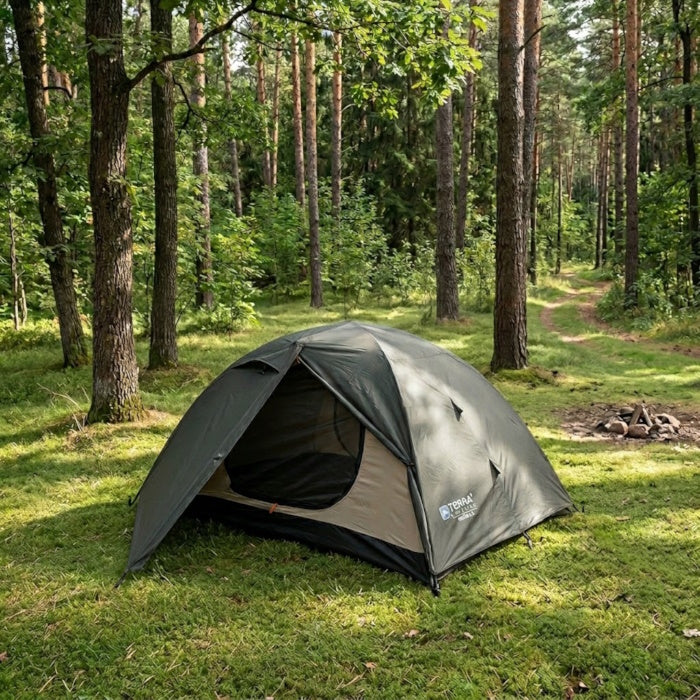 Load image into Gallery viewer, Terra Incognita Omega 2-person tent in khaki green pitched in a sunlit pine forest

