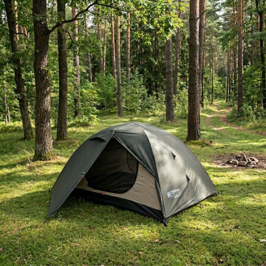 Terra Incognita Omega 2-person tent in khaki green pitched in a sunlit pine forest